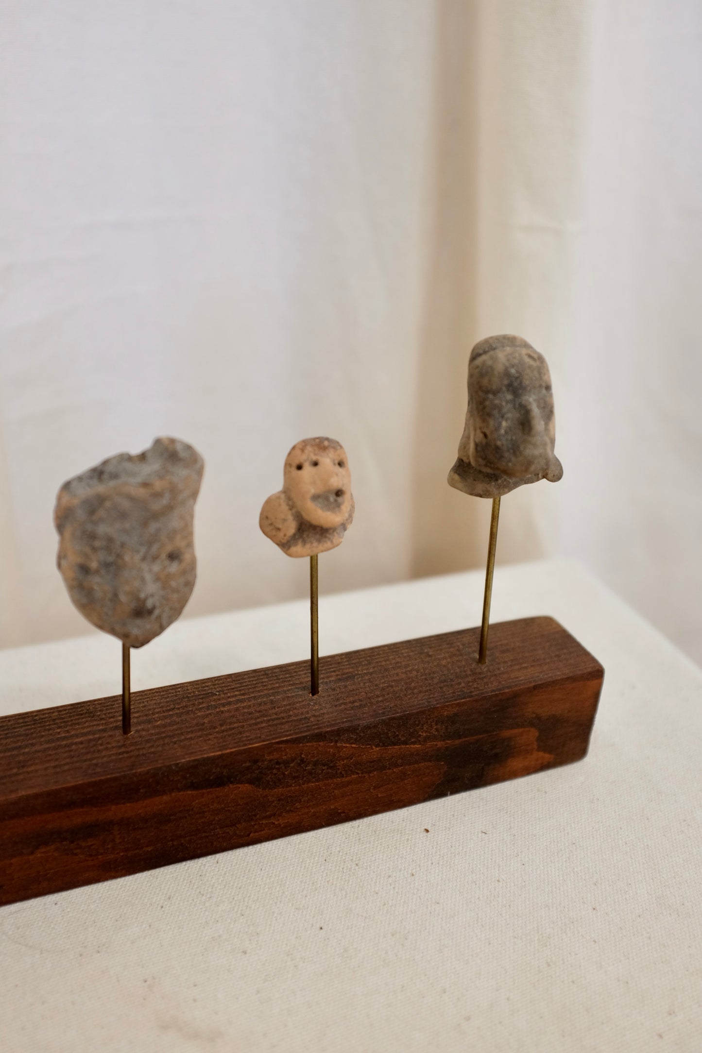 5 Latin American Effigy Heads on Wood Stand