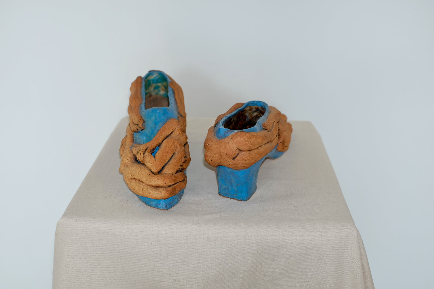 Ceramic Shoes Covered in Nude Figures