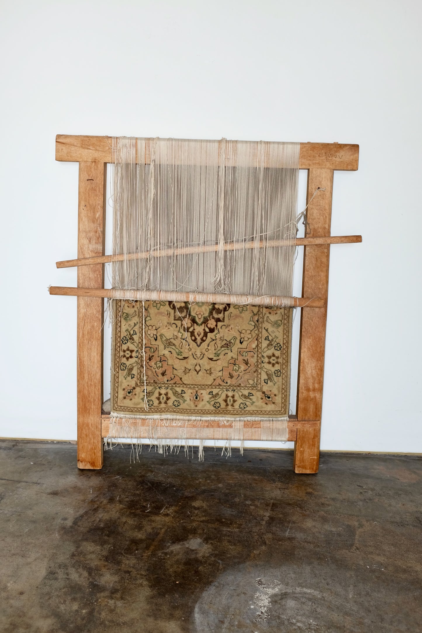 Antique Loom with Tabriz Rug in Progress