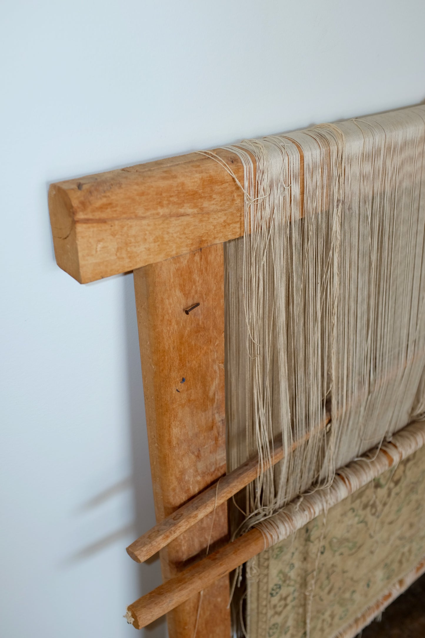 Antique Loom with Tabriz Rug in Progress