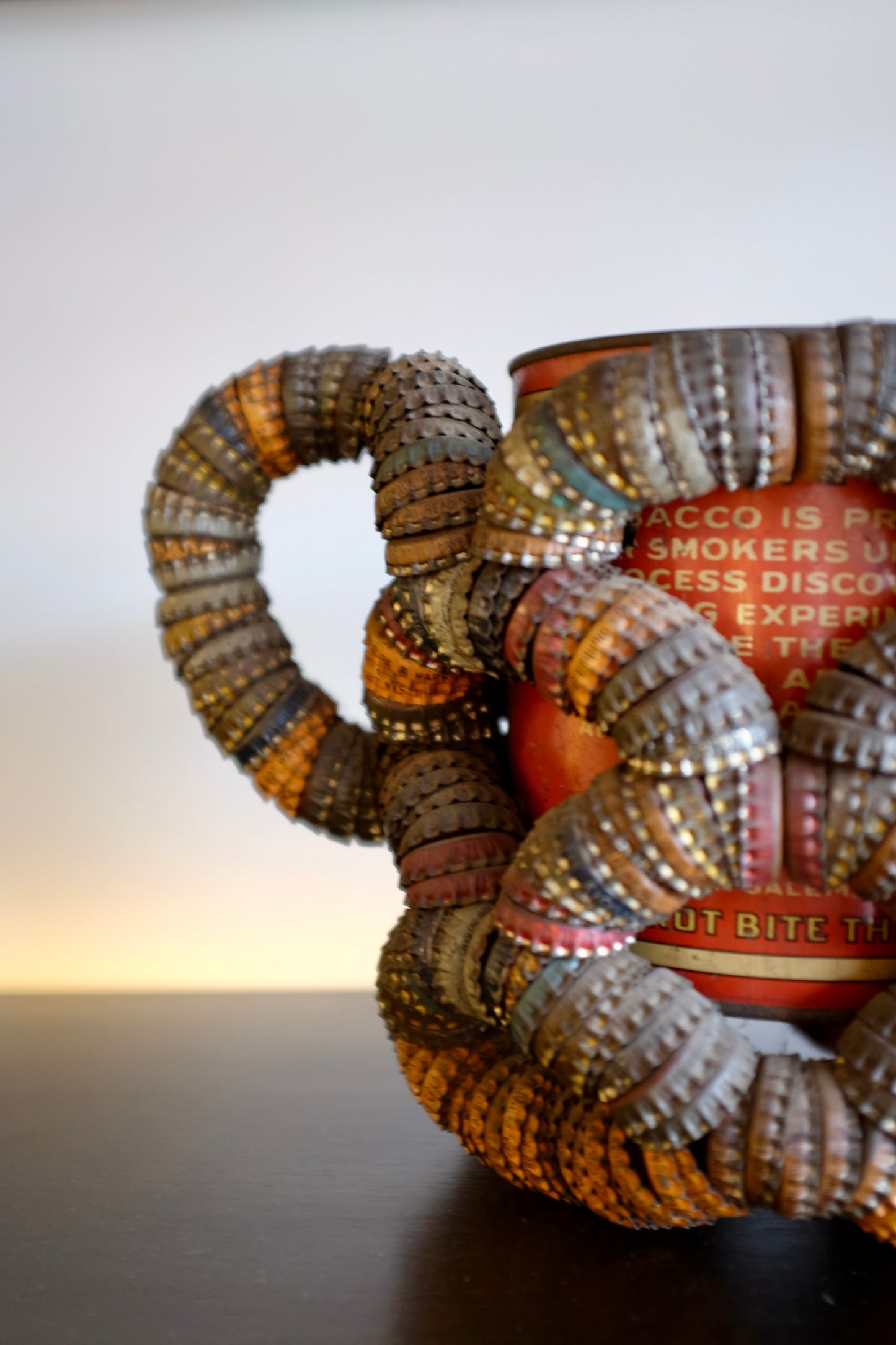 Folk Art Bottlecap Basket Over Red Can