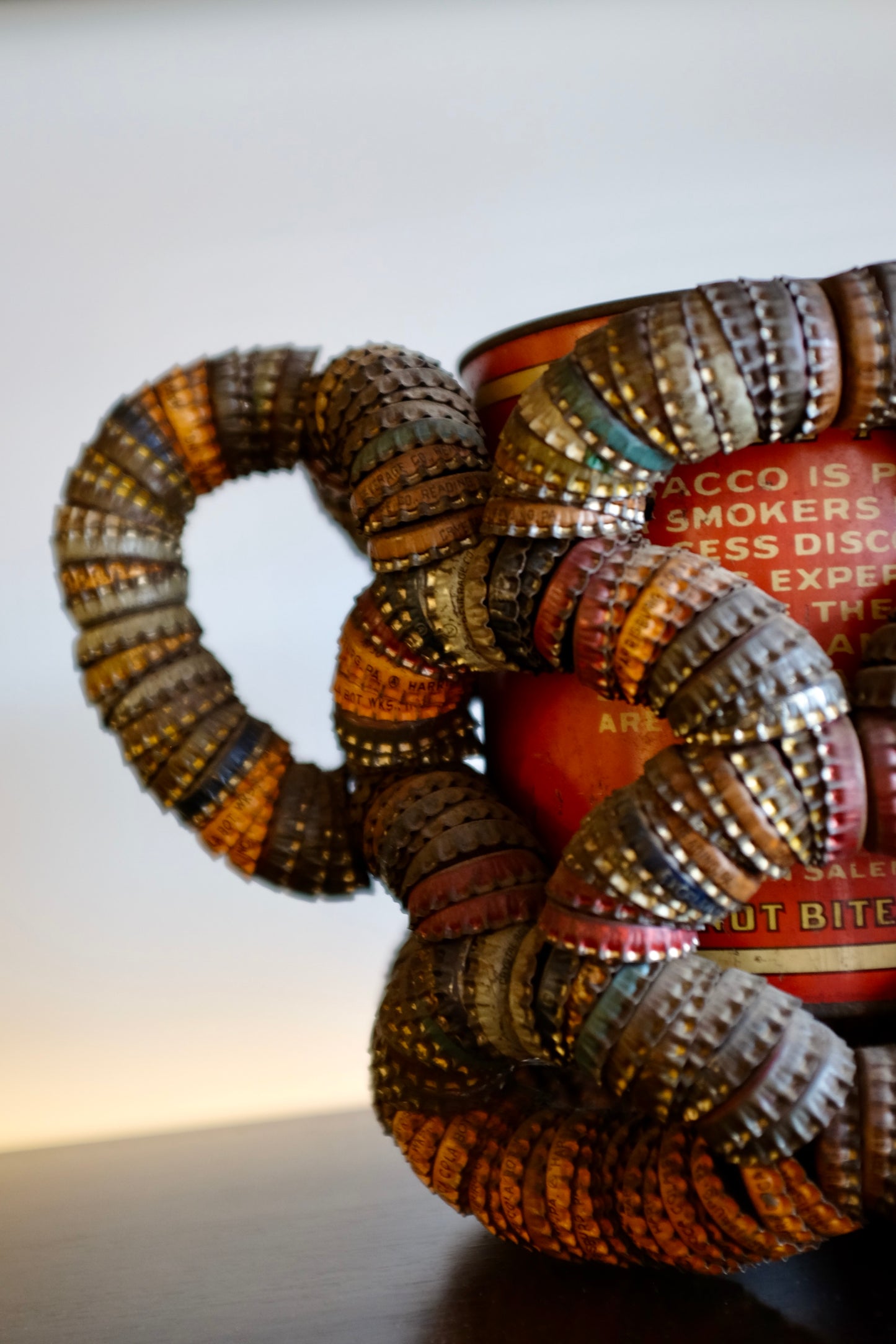 Folk Art Bottlecap Basket Over Red Can