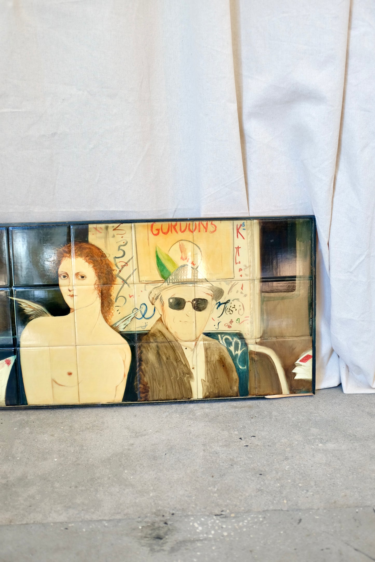 Painting on Tile of Angel and Men on the Subway