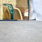 Painting on Tile of Angel and Men on the Subway