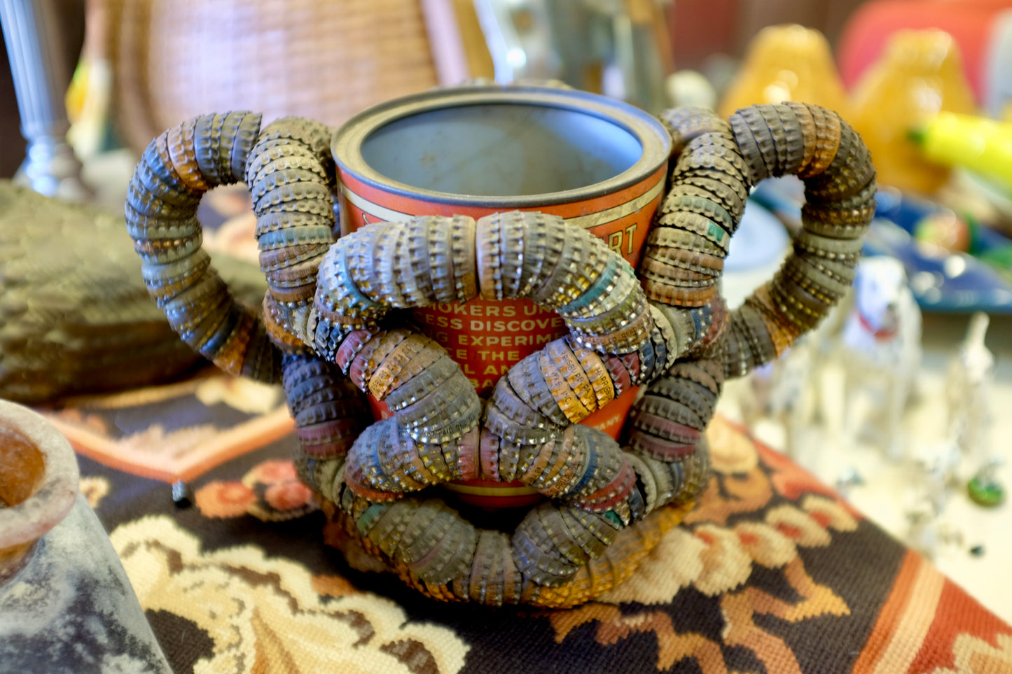 Folk Art Bottlecap Basket Over Red Can