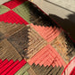 Log Cabin Quilt with Pink, Green, and Red