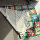 Star Pattern Quilt with Green Base